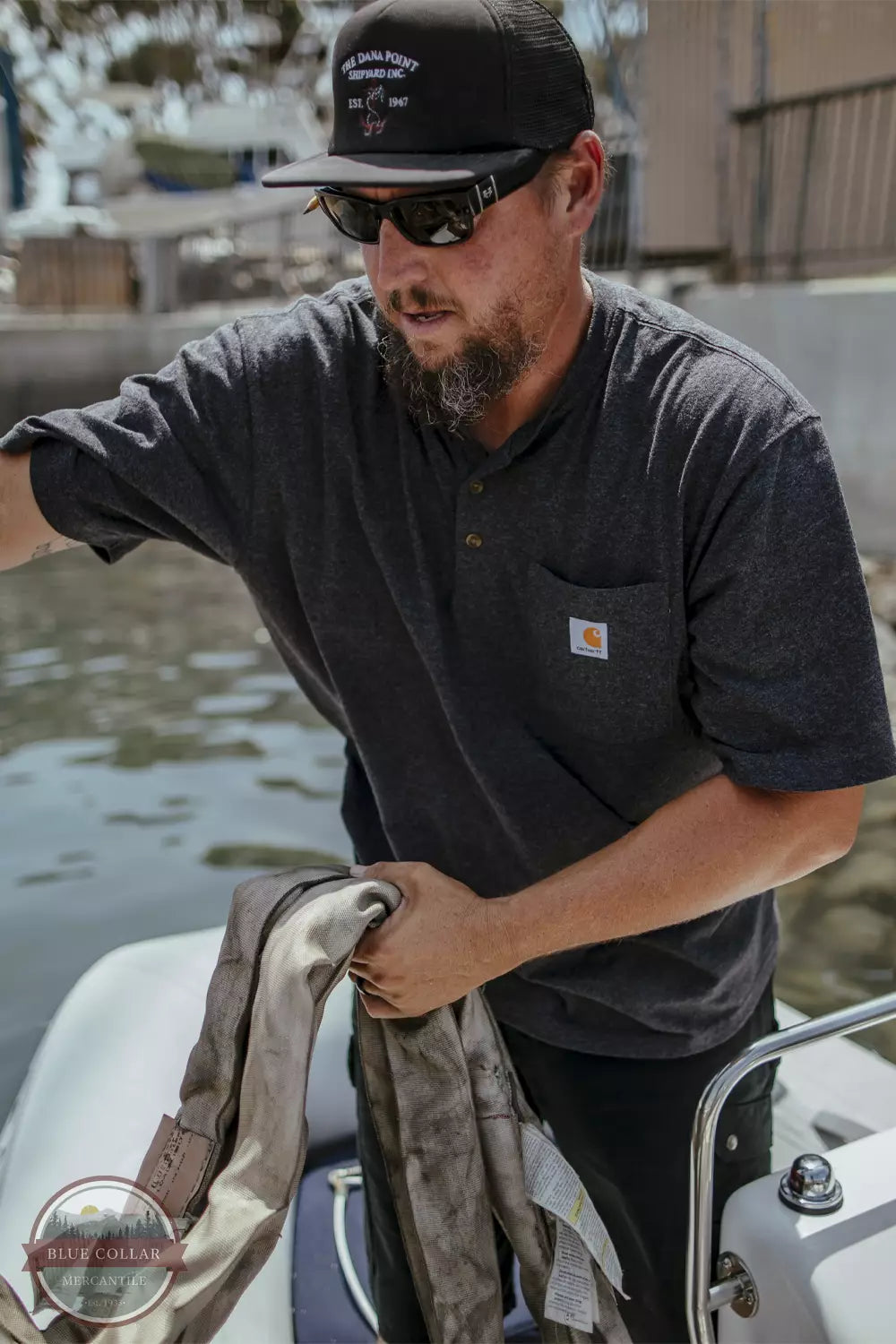 Carhartt K84 Loose Fit Heavyweight Short Sleeve Pocket Henley T-Shirt Black Life View. Available in multiple colors