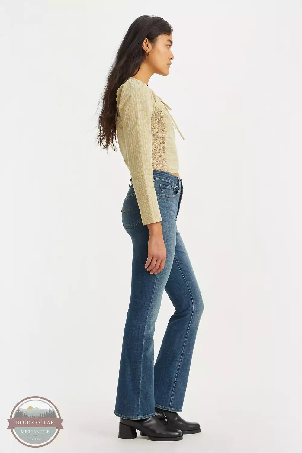 Levi's 18759-0121 725 High Rise Slim Fit Bootcut Jeans in Tore It Up Dark Wash on model side view
