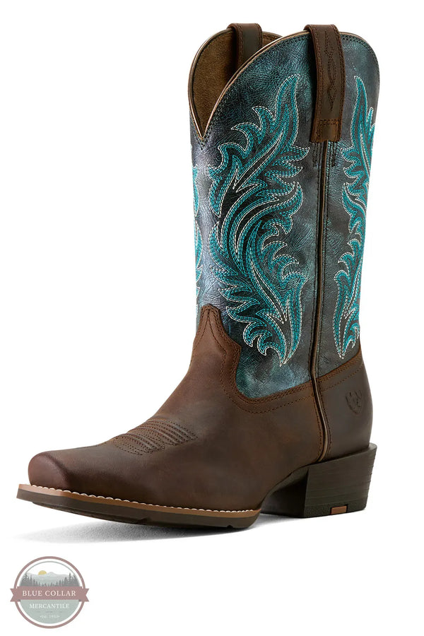 Brown cowboy boot with turquoise embroidery on a white background Ariat 10064077 Round Up Narrow Cutter Toe Western Boot