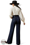 Person wearing a white shirt, dark blue jeans, and a black hat on a white background Ariat 10065877 Ultra High Rise Veronica Wide Leg Jean