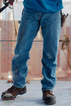Carhartt 105119-H44 Men's Relaxed Fit 5 Pocket 100% Cotton Jean in Deep Creek lifestyle image