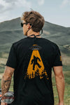 Nine Line Apparel UFOSQUATCH-TSTRI-SOLIDBLACKTRIBLEND UFO Squatch T-Shirt in Black, model