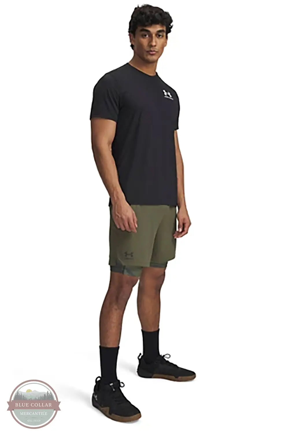 Under Armour 1389780 Freedom Vanish 2-in-1 Shorts in green, front