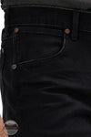 Close-up of black jeans with visible stitching and buttons. Wrangler 112358240 Retro Slim Fit Straight Leg Jean front pocket