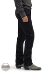 Person wearing black pants and gray shoes on a white background Wrangler 112358240 Retro Slim Fit Straight Leg Jean side view