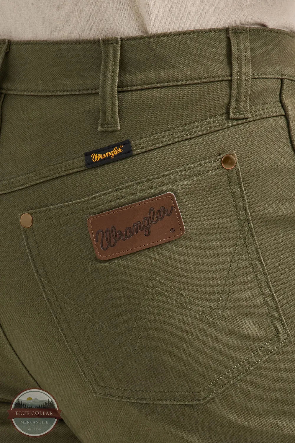 Wrangler 112361552 Cowboy Cut® Tough Comfort Premium Performance 47 Regular Fit Jean in Sea Turtle Green back pocket detail