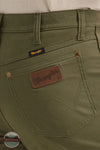 Wrangler 112361552 Cowboy Cut® Tough Comfort Premium Performance 47 Regular Fit Jean in Sea Turtle Green back pocket detail