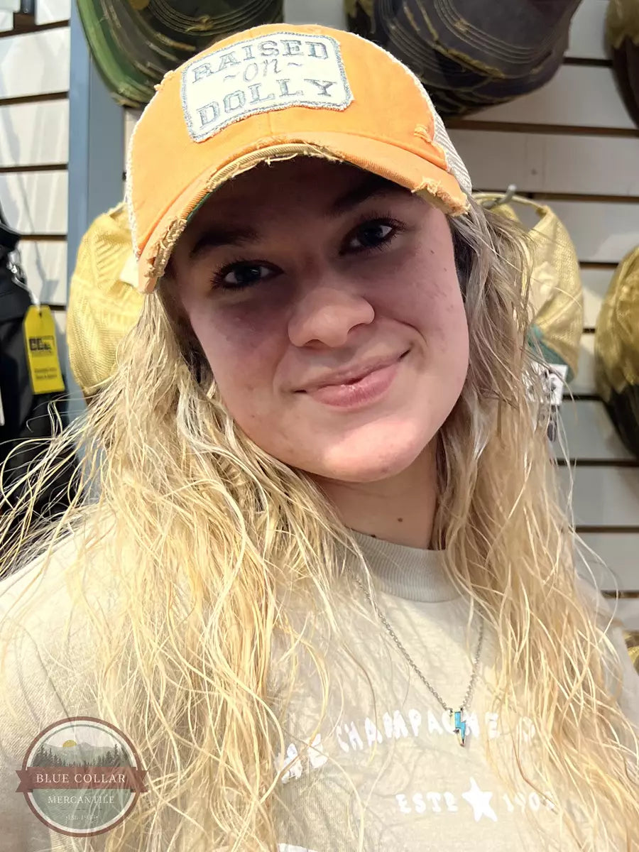 The Goat Stock Raised On Dolly Cap in Orange Life View