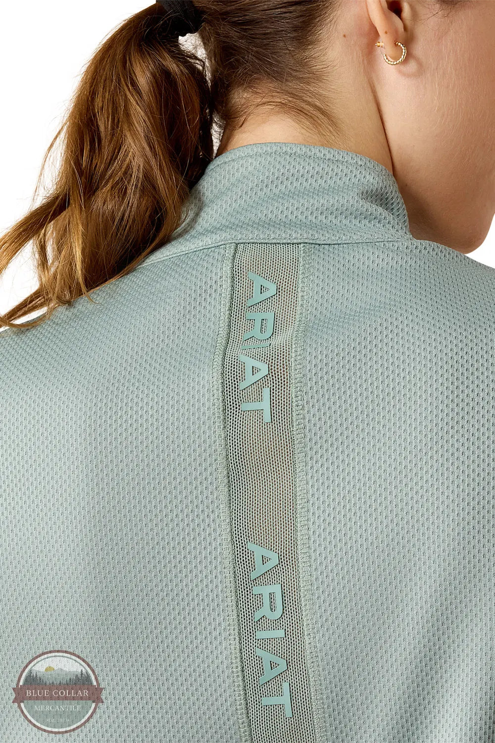 Ariat 10071807 Women's Breather Half Zip Pullover Sweatshirt in Green close up of back with logo