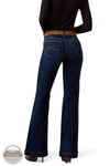 Ariat 10079195 Women's Perfect Rise Vilma Ultrastretch Trouser Jeans in Hayward, Rear view of a model wearing dark blue flare jeans with a brown leather belt, a black long-sleeve top, and brown heels against a white background.