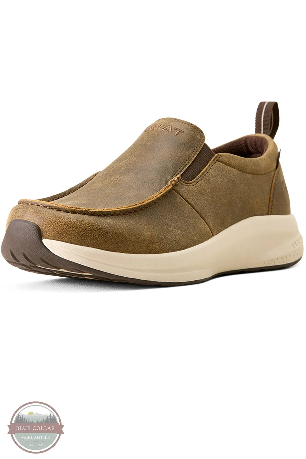Ariat 10080275 Men's Buckeye Slip On Waterproof Shoe in Brown Bomber, A slip-on casual shoe in brown suede-like material with a thick cream-colored midsole and a dark brown outsole, shown on a white background.