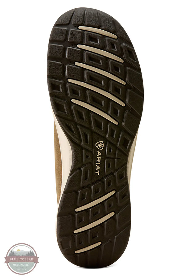 Ariat's 10080297 Women's Buckeye Slip On Waterproof Shoe in Brown Bomber, The outsole of an Ariat shoe, showing a dark brown tread pattern with beige accent grooves and the Ariat logo printed on the center, set against a plain white background.