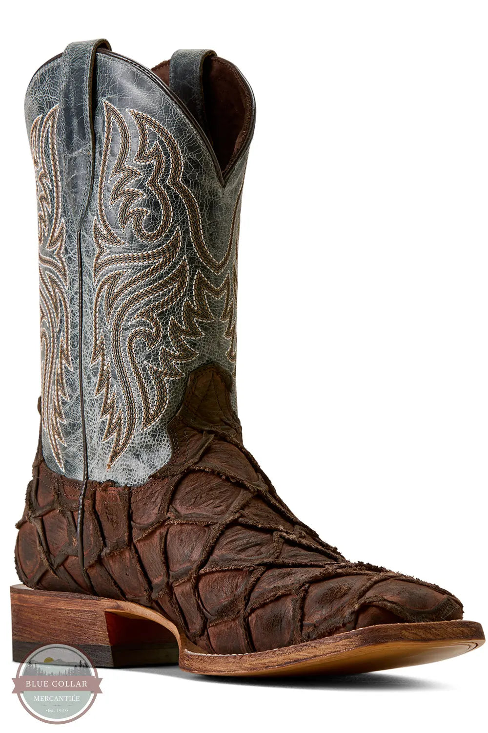 Ariat's 10080345 Men's Riverside Exotics Print Square Toe Western Boot in Chocolate Bass Print / Indigo Honor Blue, A single brown western cowboy boot with a textured crocodile-embossed toe and upper shaft, featuring a gray suede-like shaft with white embroidered scrollwork, shown on a white background.