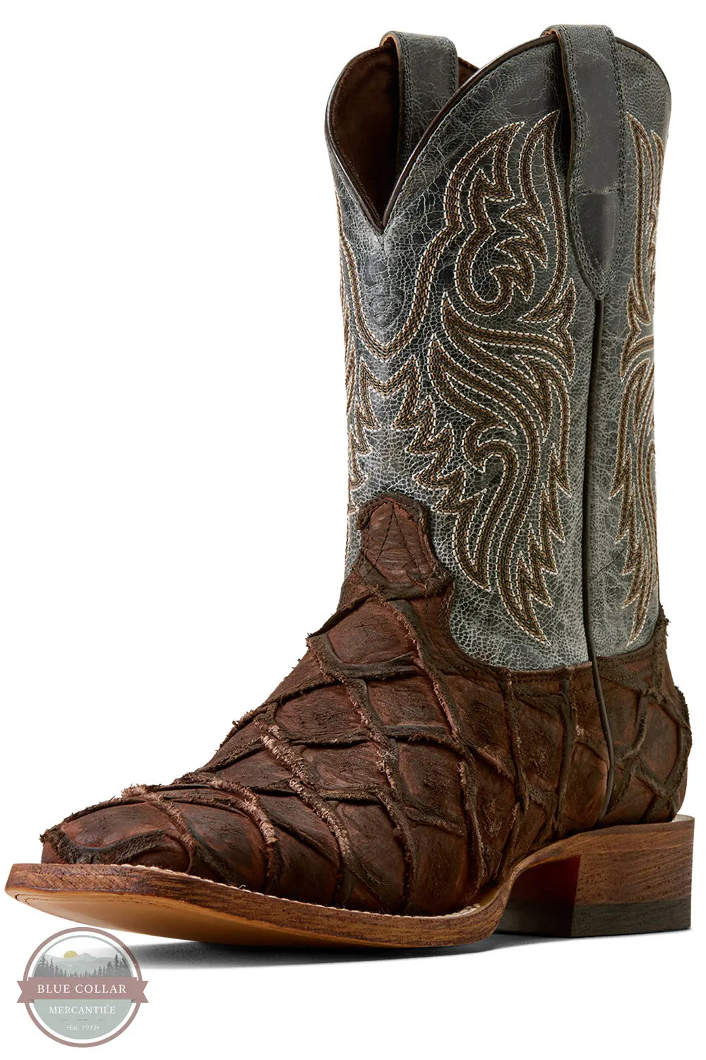 Ariat's 10080345 Men's Riverside Exotics Print Square Toe Western Boot in Chocolate Bass Print / Indigo Honor Blue, A single western cowboy boot shown in profile on a white background. The boot has a dark brown crocodile-embossed toe and midfoot, a medium brown stitched shaft, and a gray-green textured upper shaft with white embroidery.