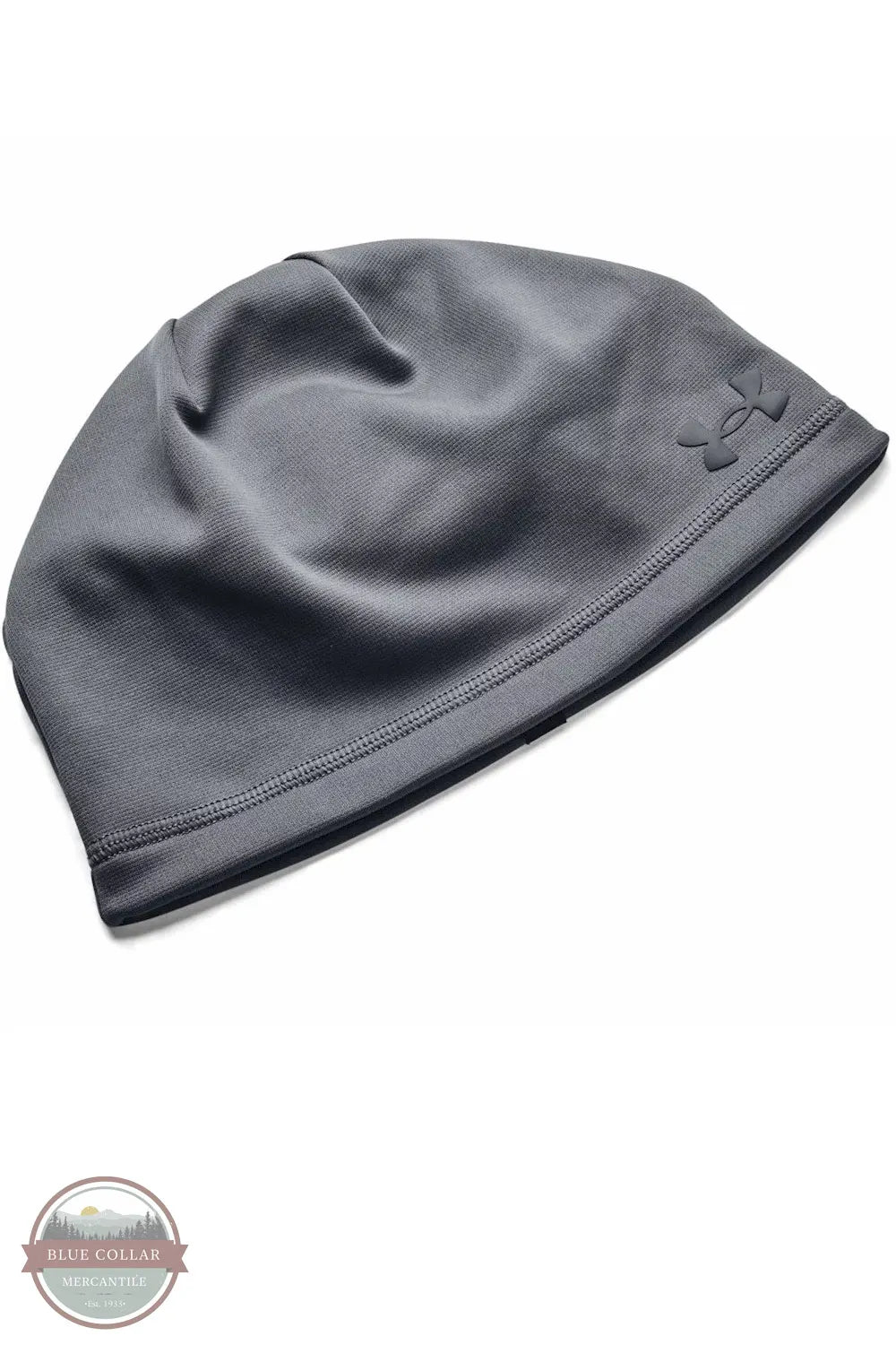 Under Armour 1365918 UA Men's Storm Beanie, A dark gray athletic beanie hat with a tonal Under Armour logo on the side, displayed on a clean white background.