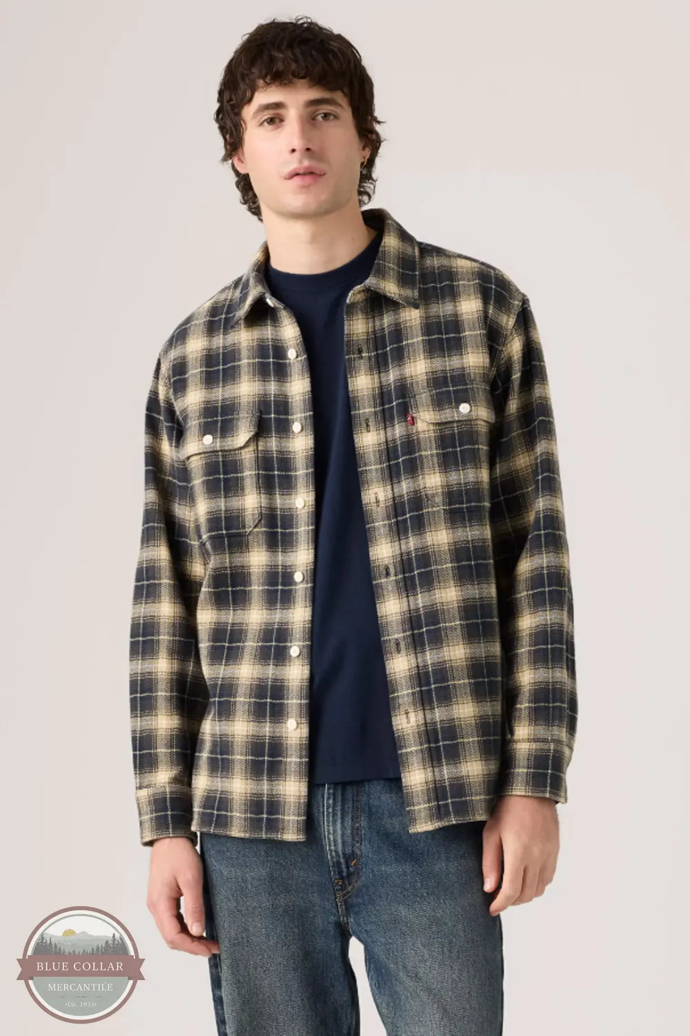 Levi's 19587-0429 Men's Classic Worker Long-Sleeve Flannel Shirt model wearing Calvin Plaid Nightfall Navy colored shirt