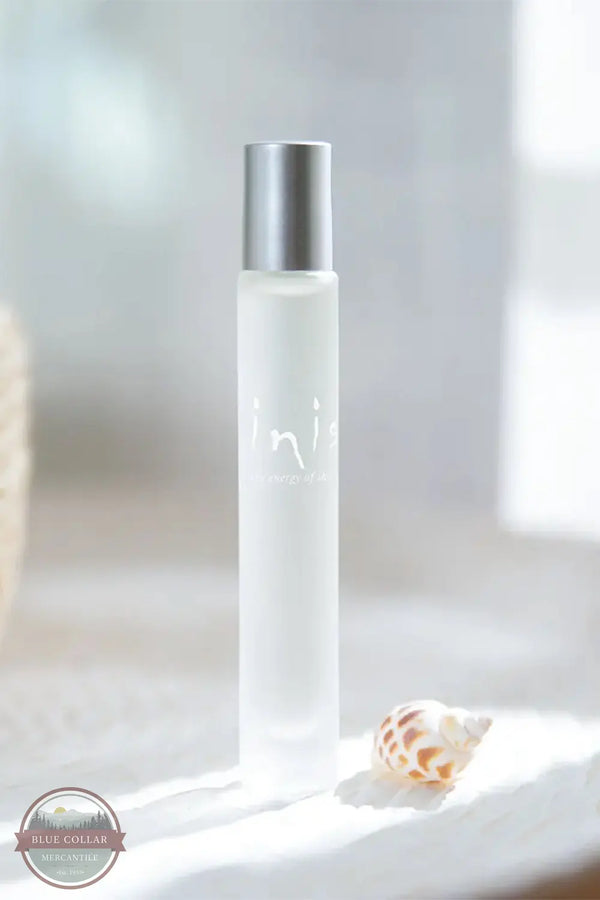 Inis 8017130 Roll On Eau De Parfum .27FL OZ. on beach background shown