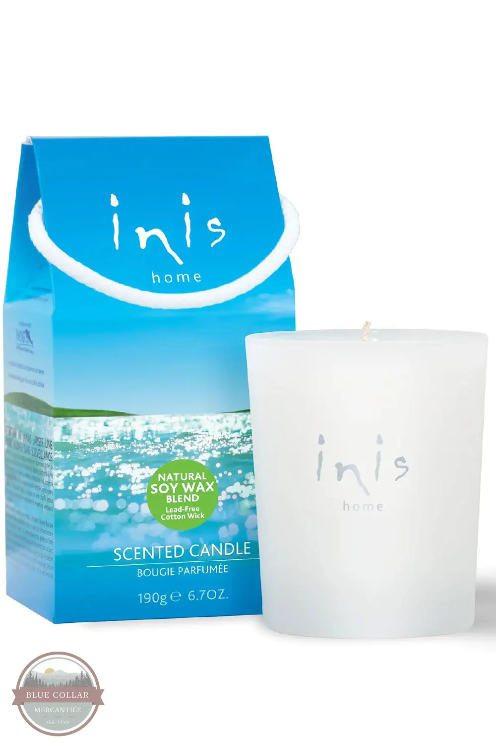 Inis 8017185 Scented Candle 6.7 oz., An Inis Home scented candle in a frosted white glass jar next to its blue packaging box, featuring a blue sky and ocean design with a green 'Natural Soy Wax' badge.