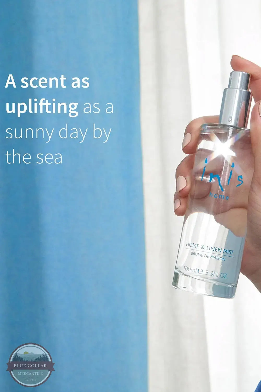 Inis 8020901 Home & Linen Mist 3.3fl. oz., A hand holds a clear perfume bottle labeled 'inis' against a bright blue and white curtain background, with promotional text on the left.