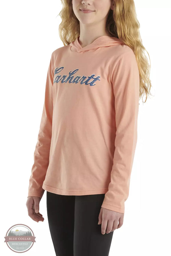 Carhartt CA9981-P399 Long Sleeve Hooded Cursive Logo T-Shirt in Peach Amber Profile View