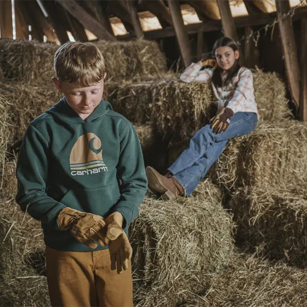 Fall 2026 Seasonal Apparel available at Blue Collar Mercantile The Workingman's Store in Winchester, VA kids shown relaxing on hay bails in a barn