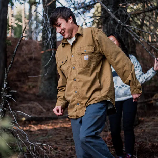 Fall 2026 Apparel found at Blue Collar Mercantile The Workingman's Store in Winchester, VA image of man in fall wearing a Carhartt Shacket in the woods