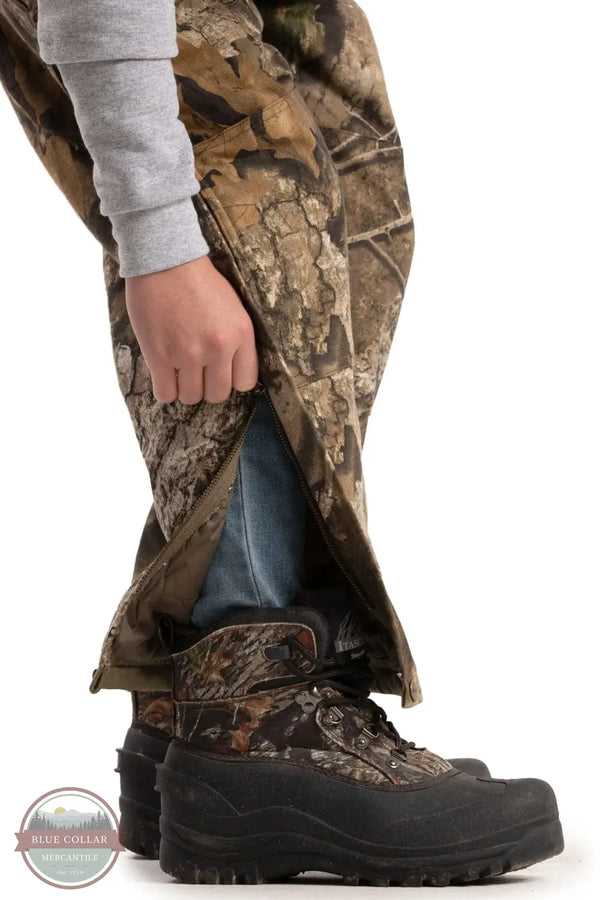 Berne BB21APX Youth Softstone Insulated Bib Overall in Realtree APX Camouflage leg zipper detail