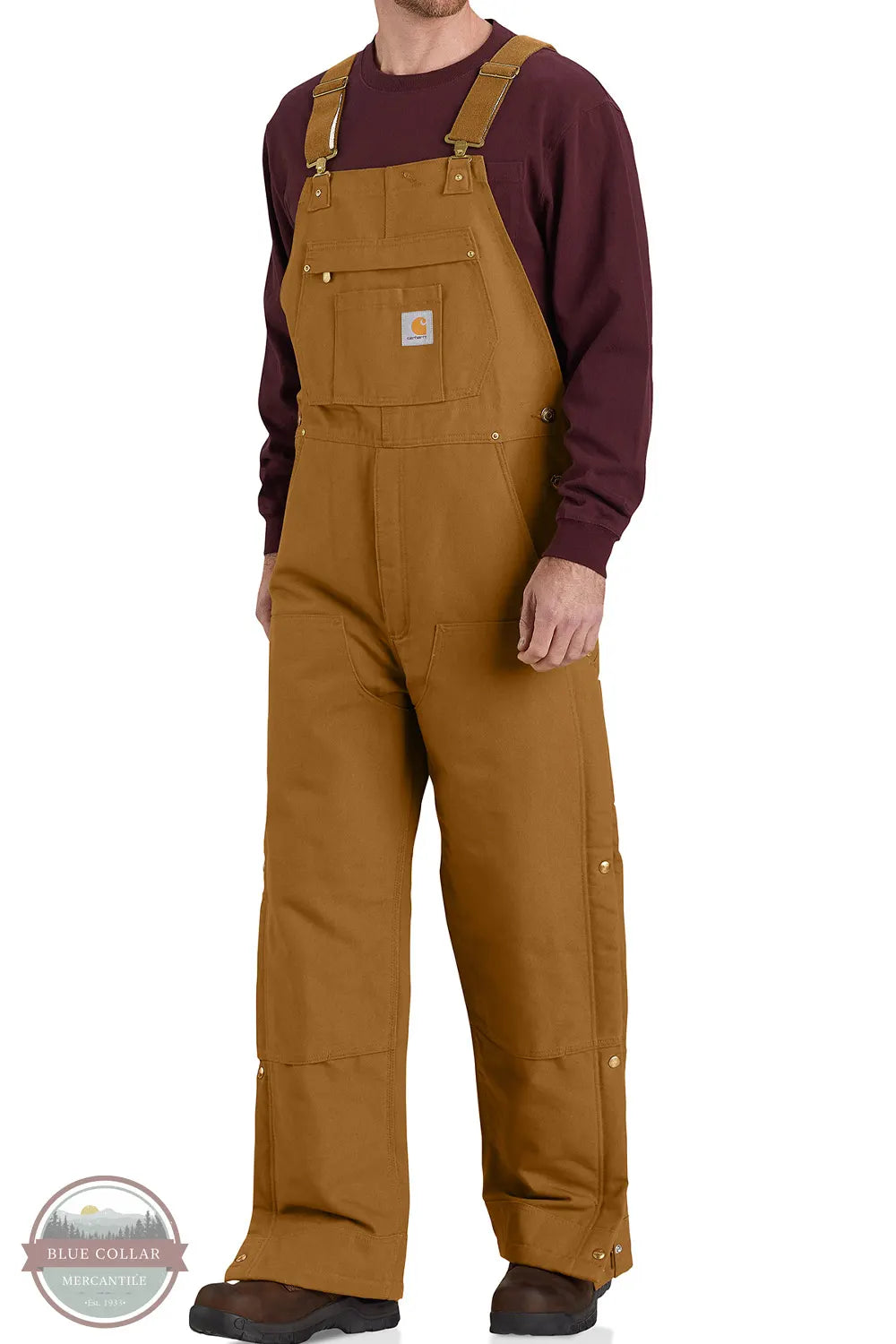 Carhartt 106672 Loose Fit Firm Duck Insulated Bib Overall - 2 Warmer Rating in Carhartt Brown on model