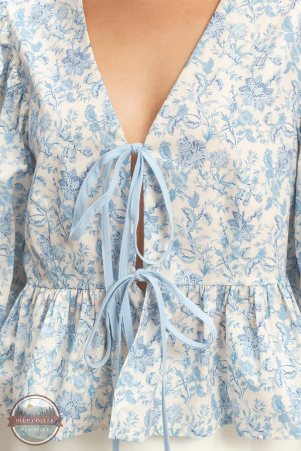 Floral Tie-Front Peplum Blouse | HYFVE Puff Sleeve Top front detail view