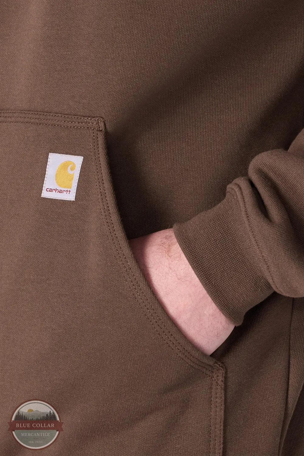 Carhartt Iconic K288-EE6 Loose Fit Midweight Logo Sleeve Hoodie for Fall Shown in Dark Clove kangaroo pocket detaill shown