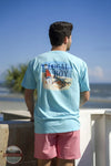 Local Boy Outfitters L1000712-AQU Sandy Crab T-Shirt in Aqua Blue man on beach wearing it