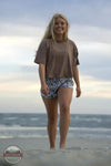 Local Girl Outfitters L5160012 LG Vista Shorts lifestyle image of girl on beach