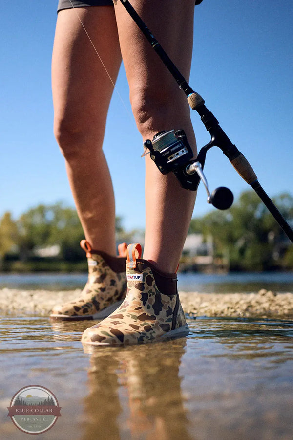 XTRATUF Women's Ankle Deck Boot Sport lifestyle photo of woman fishing