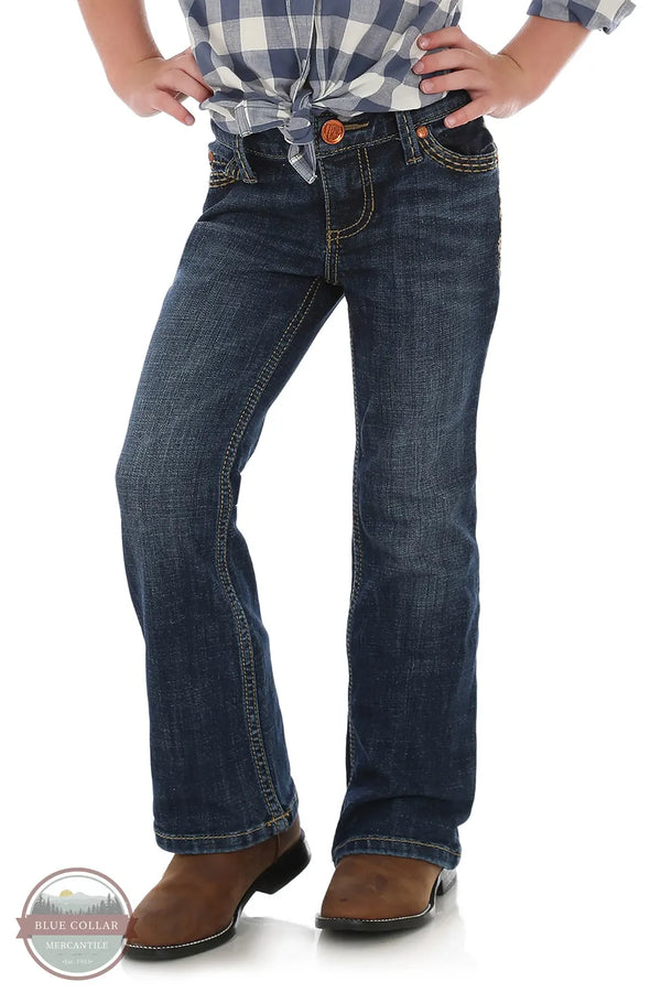 Person wearing blue jeans and a plaid shirt on a white background Wrangler 09MWGHS Girls Denver Retro Bootcut Jean