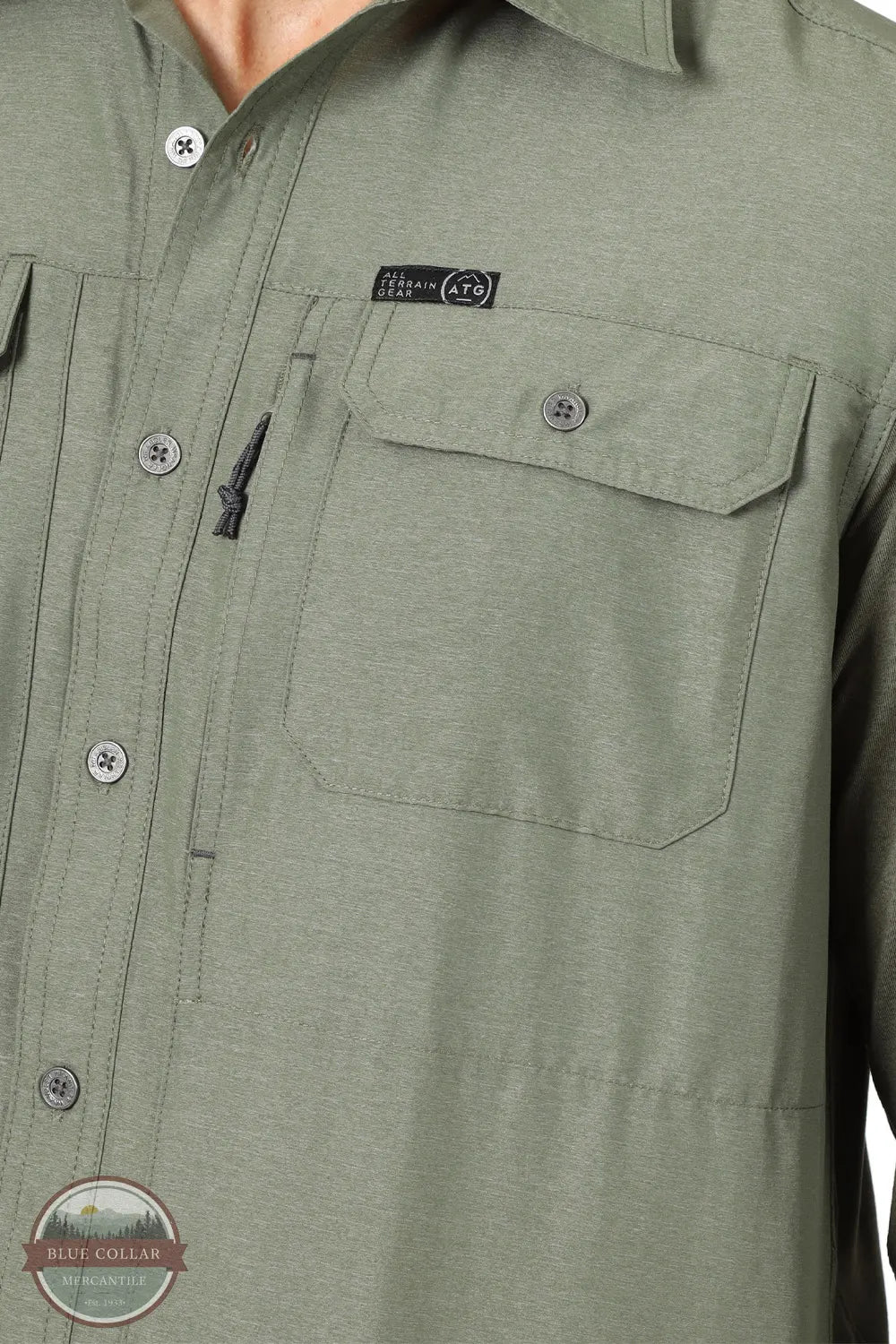 Wrangler NSB89DV Wrangler ATG™ Men's Mix Material Long Sleeve Shirt in Dusty Olive Green front pockets view