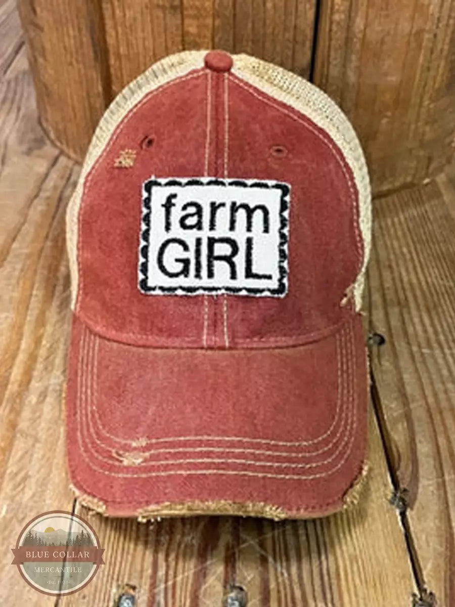 The Goat Stock Farm Girl on Red Cap Front View