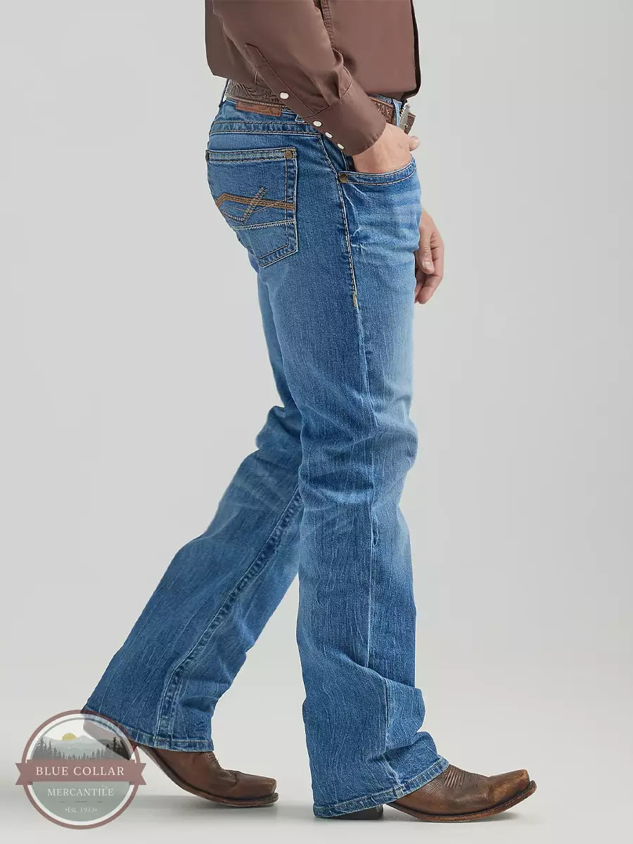 Wrangler 112325805 Rock 47 Slim Fit Bootcut Leg Jeans in Six Strings Side View